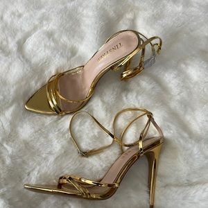 Metallic gold heels